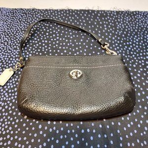 Coach Black Pebbled leather wristlet/mini handbag with clasp front enclosure